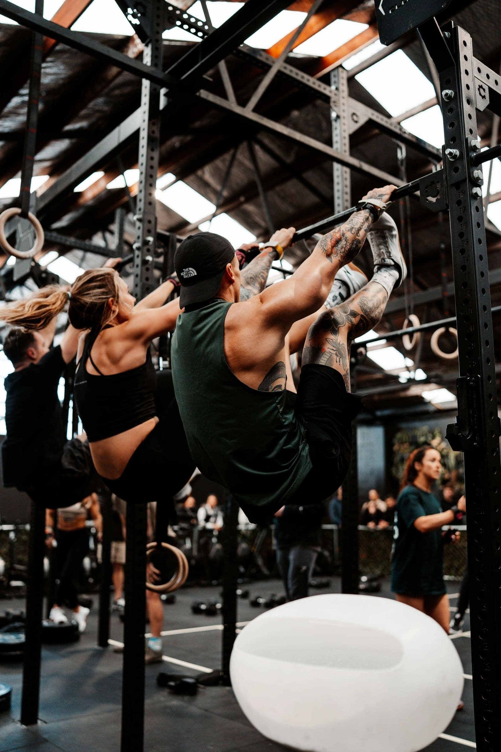 Two athletes training side by side at Hybrid Theory