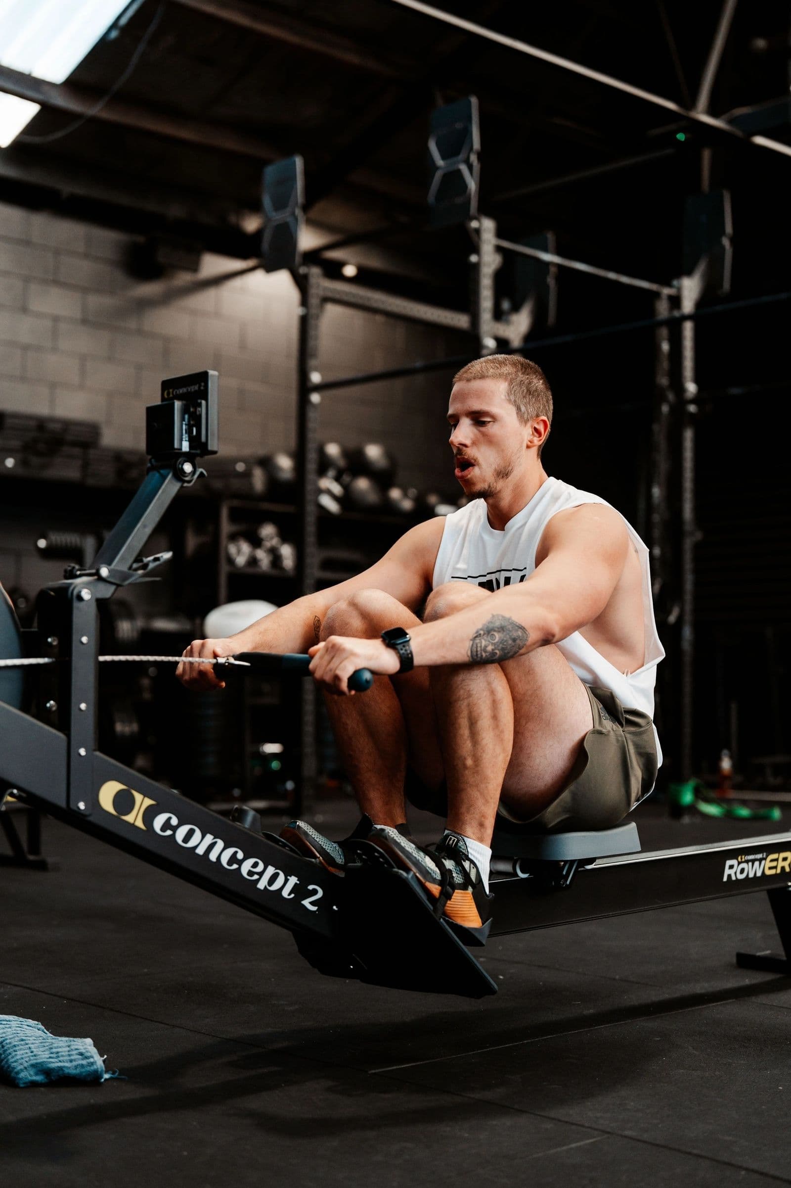 Members mid-conditioning workout in a Hybrid Sweat class