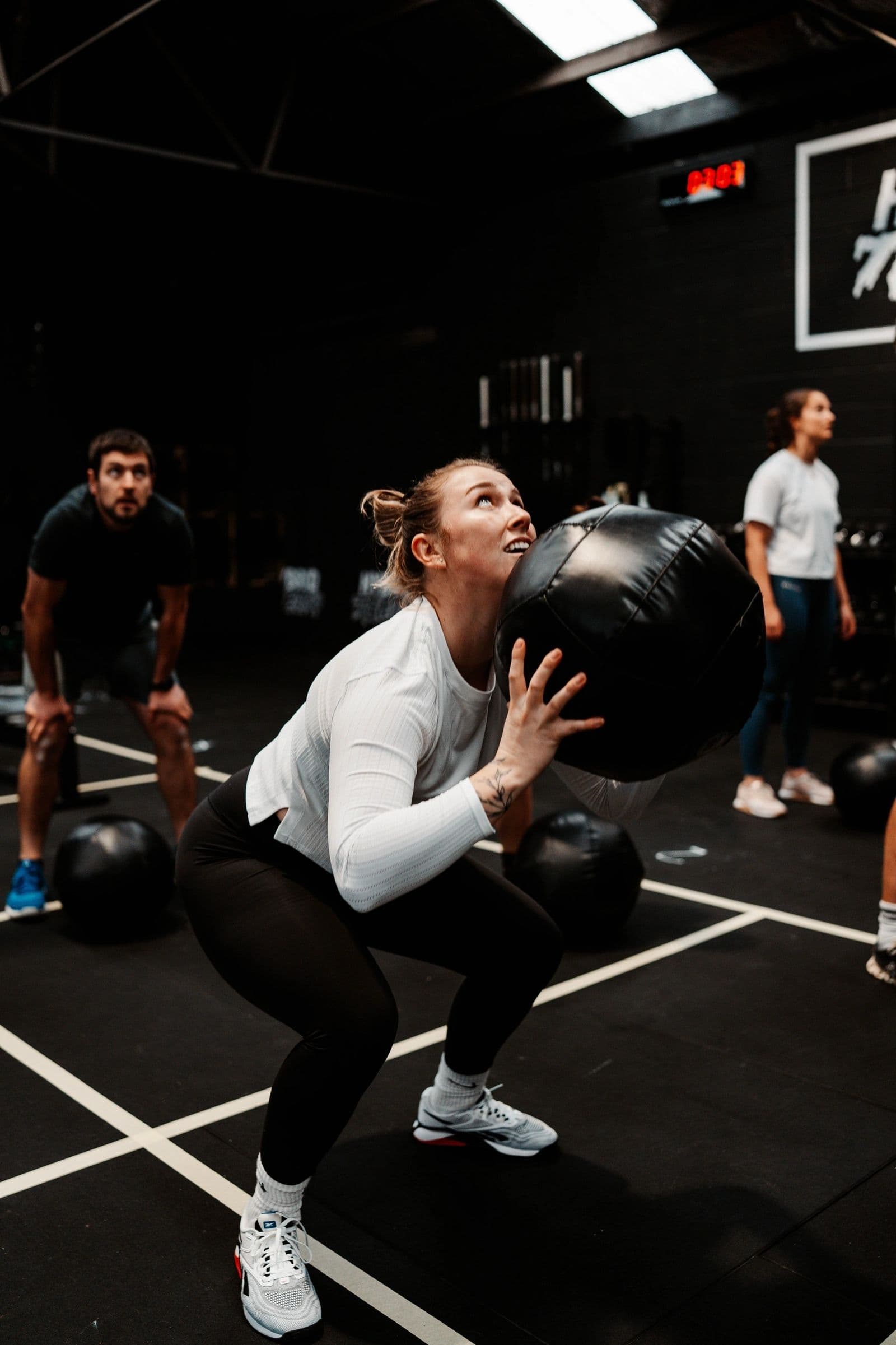Members mid-session on the gym floor during Hybrid Training at Hybrid Theory, Christchurch